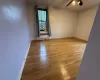 Primary Bedroom featuring Hardwood Flooring