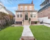 View of front of property featuring a front lawn