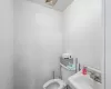 Bathroom with toilet and sink