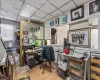 Office featuring wood-type flooring, a paneled ceiling, and cooling unit