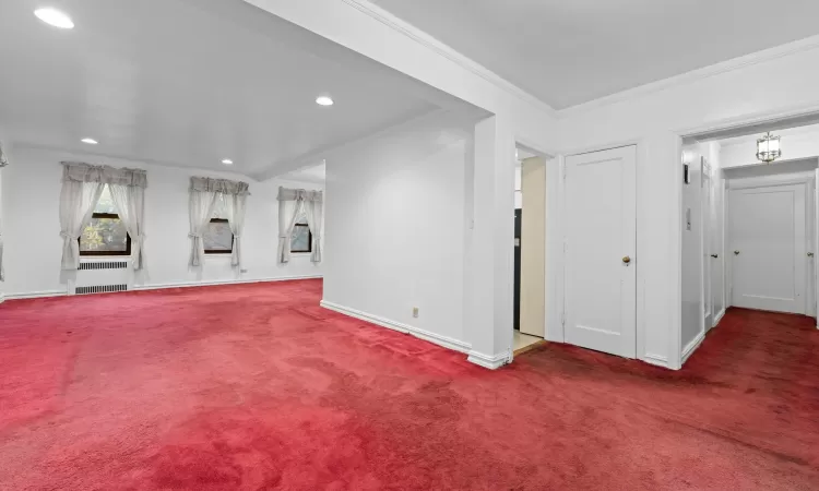 Full bathroom with toilet, vanity, tile walls, and shower with separate bathtub