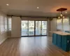 Great room natural light , barn doors leading to front porch