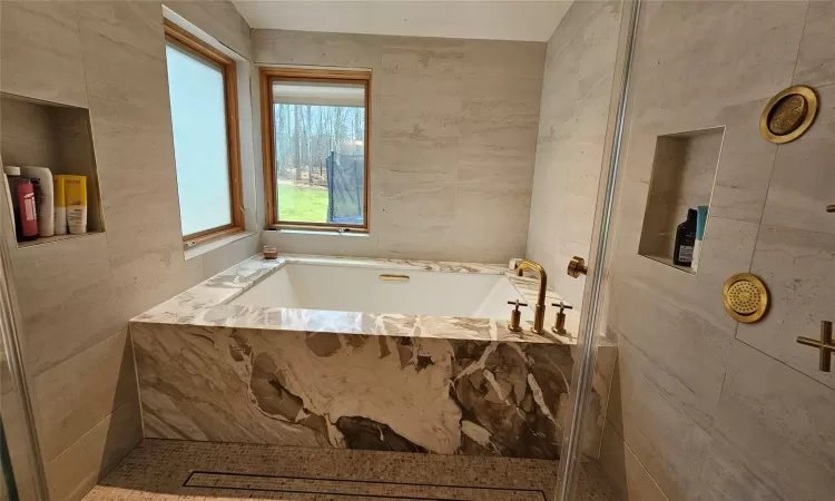 Bathroom with toilet and tile patterned floors