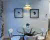 Dining room featuring hardwood / wood-style flooring and a baseboard radiator