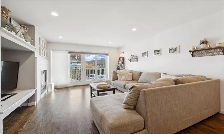 Living room featuring dark wood-type flooring