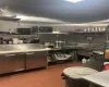 Kitchen featuring light tile patterned floors