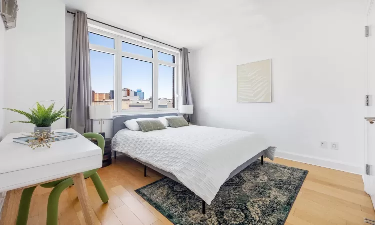 Bedroom featuring hardwood / wood-style floors