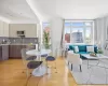 Dining space featuring sink and light wood-type flooring