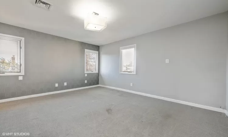 Spare room with carpet flooring