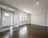 Foyer entrance featuring ornamental molding