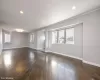 Empty room featuring dark wood-type flooring