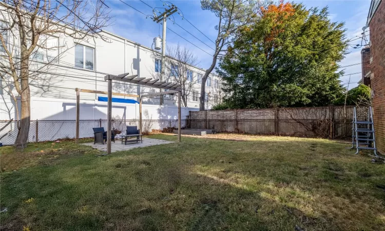 View of yard with a patio area