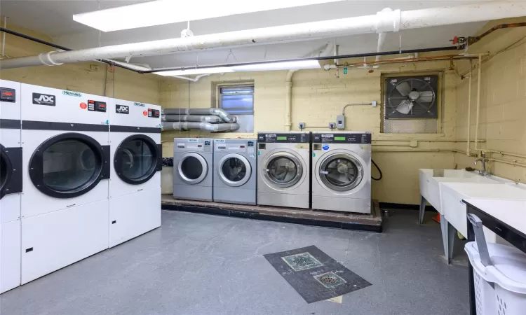 Clothes washing area with washer and clothes dryer