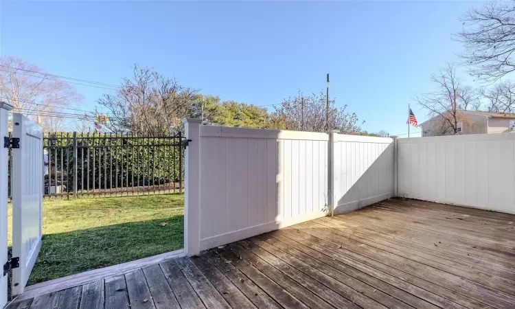 Wooden deck with a yard