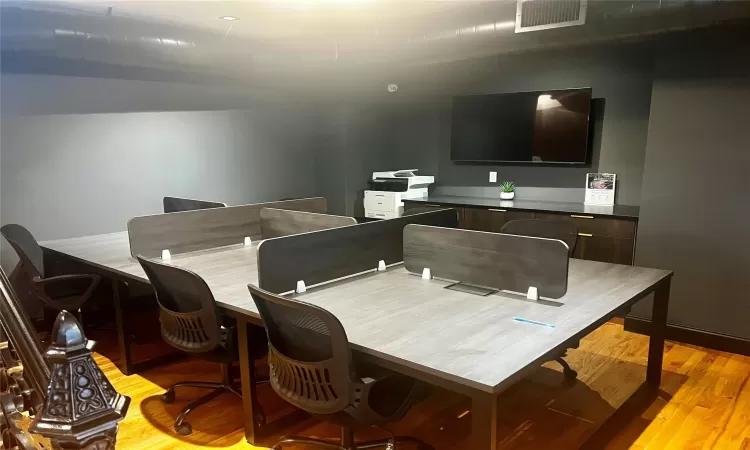 Office area featuring light hardwood / wood-style floors