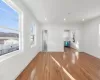 Unfurnished living room with light wood-type flooring