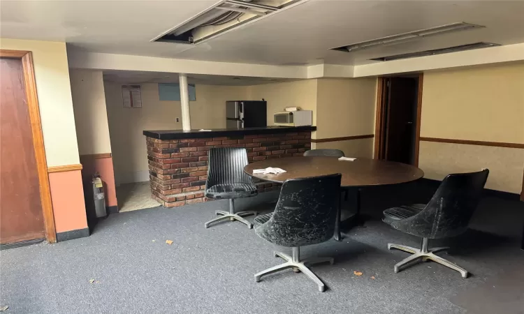 View of carpeted dining space