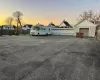 View of garage at dusk