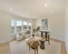 Living room with light hardwood / wood-style floors