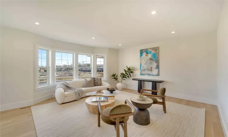 Living room featuring light hardwood / wood-style flooring