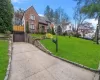 Tudor house with a front lawn