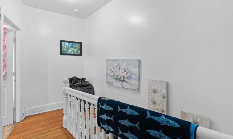 Bedroom featuring hardwood / wood-style floors