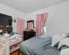 Bedroom featuring hardwood / wood-style flooring