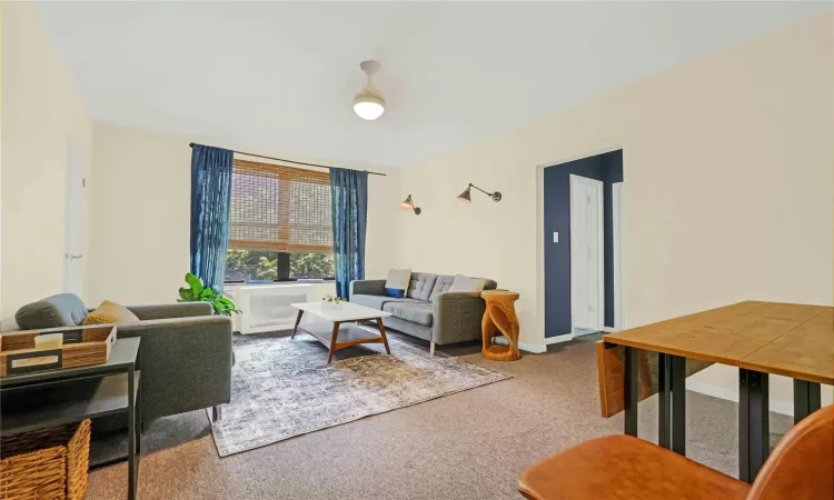 Living room with carpet floors