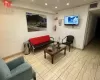 Living room with light tile patterned floors