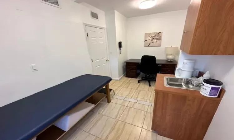 Home office featuring sink