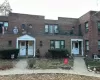 View of property featuring a balcony and cooling unit