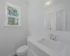 Bathroom with vanity and toilet