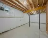 View of basement insulated ceiling & walls.