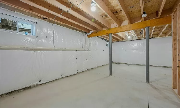 View of basement insulated ceiling & walls.