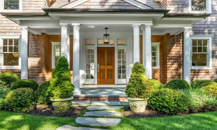 Entrance to property with a porch