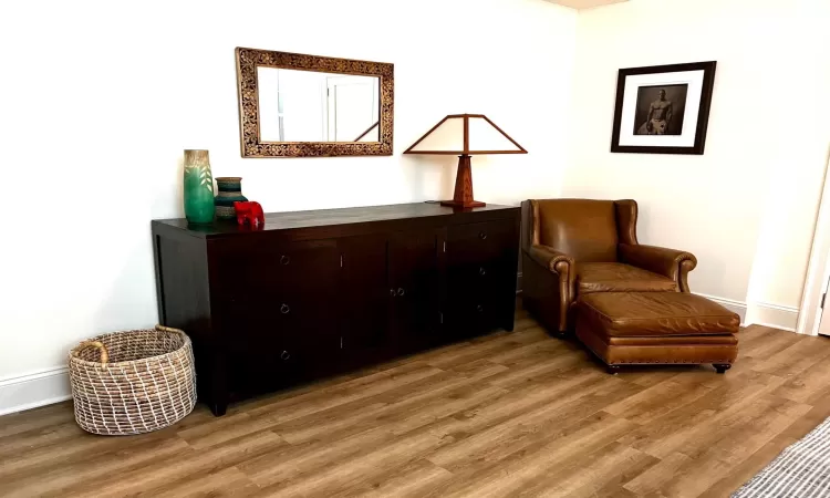 Sitting room featuring light wood-type flooring