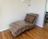 Living area featuring hardwood / wood-style floors