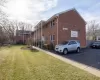 View of home's exterior with a yard