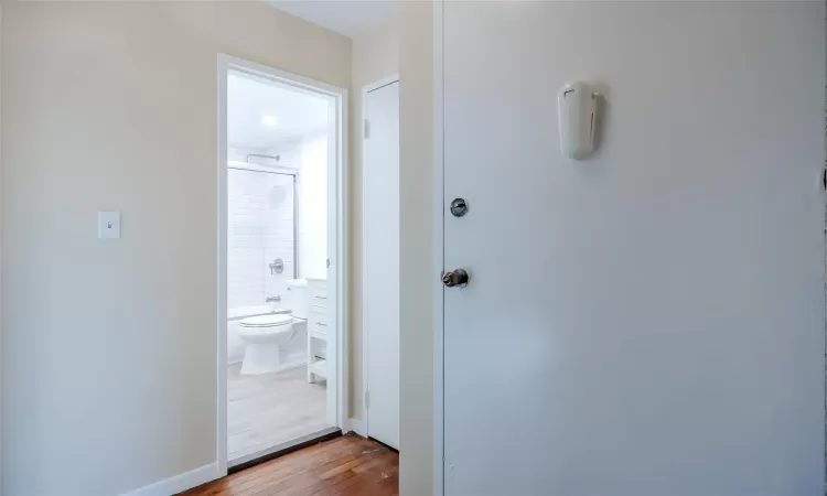 Hallway featuring hardwood / wood-style flooring