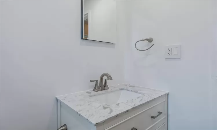 Bathroom featuring vanity