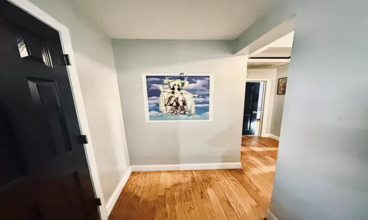 Hall featuring hardwood / wood-style floors