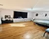 Bedroom featuring a baseboard radiator and light hardwood / wood-style floors