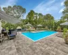 View of pool featuring a gazebo and a patio