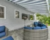 View of patio featuring outdoor lounge area and a grill