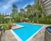 View of swimming pool with a patio area