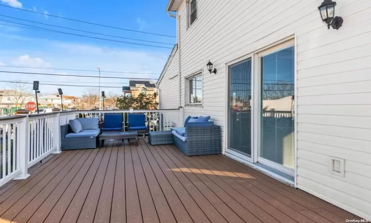 Deck with an outdoor hangout area