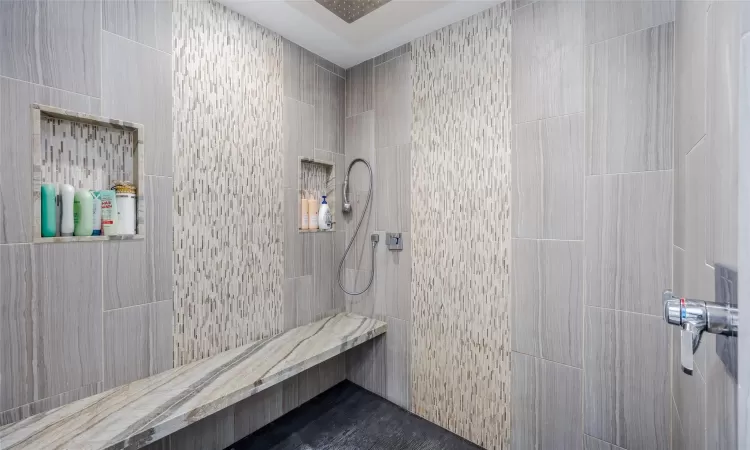 Bathroom featuring tiled shower