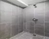 Bathroom with a tile shower