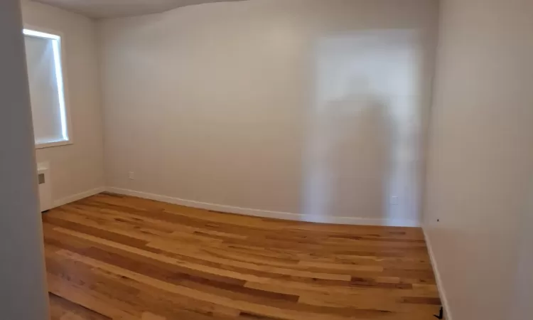 Empty room featuring light hardwood / wood-style floors