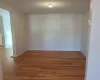 Empty room with wood-type flooring